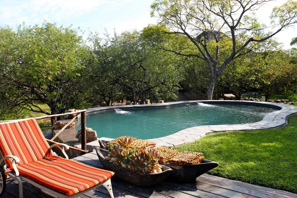 Toshari Lodge Okaukuejo Bagian luar foto